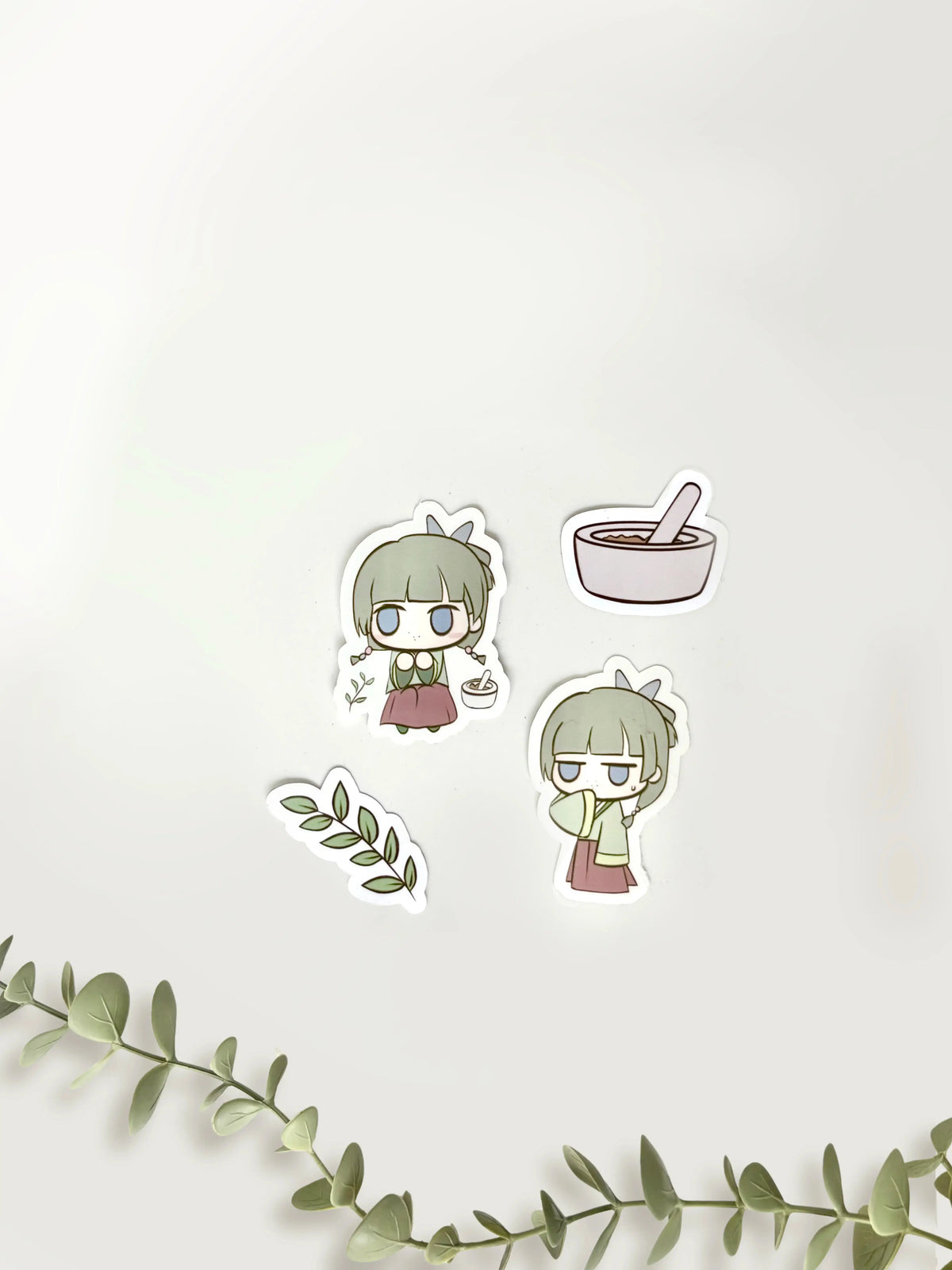 Anime sticker pack featuring small and medium chibi stickers with soft colors on sticker sheet