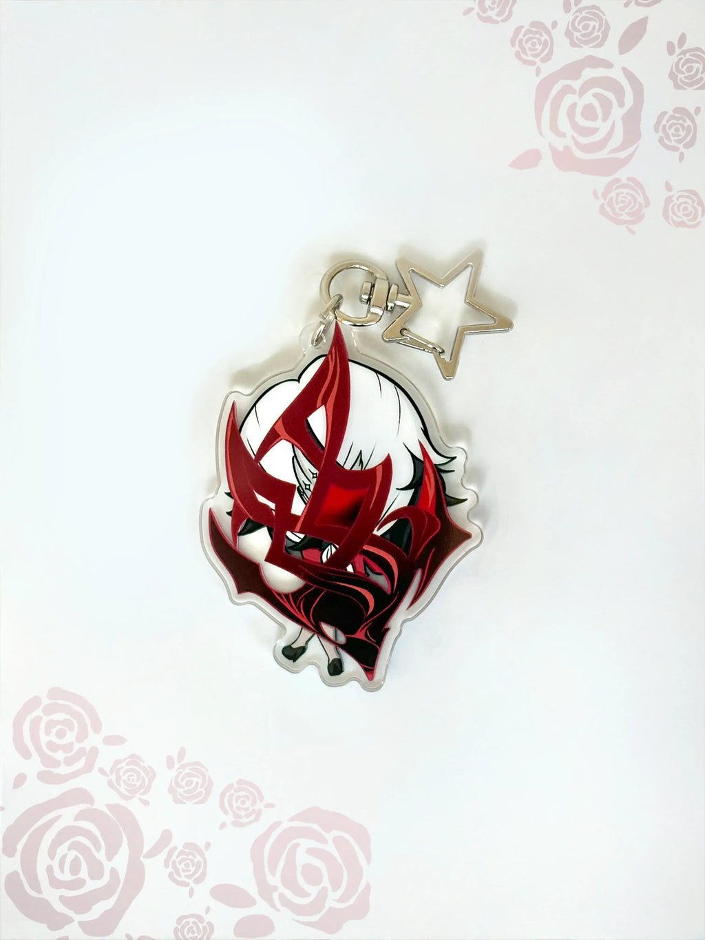 Back view of the Arlecchino anime keychain showcasing a unique alternate art illustration.