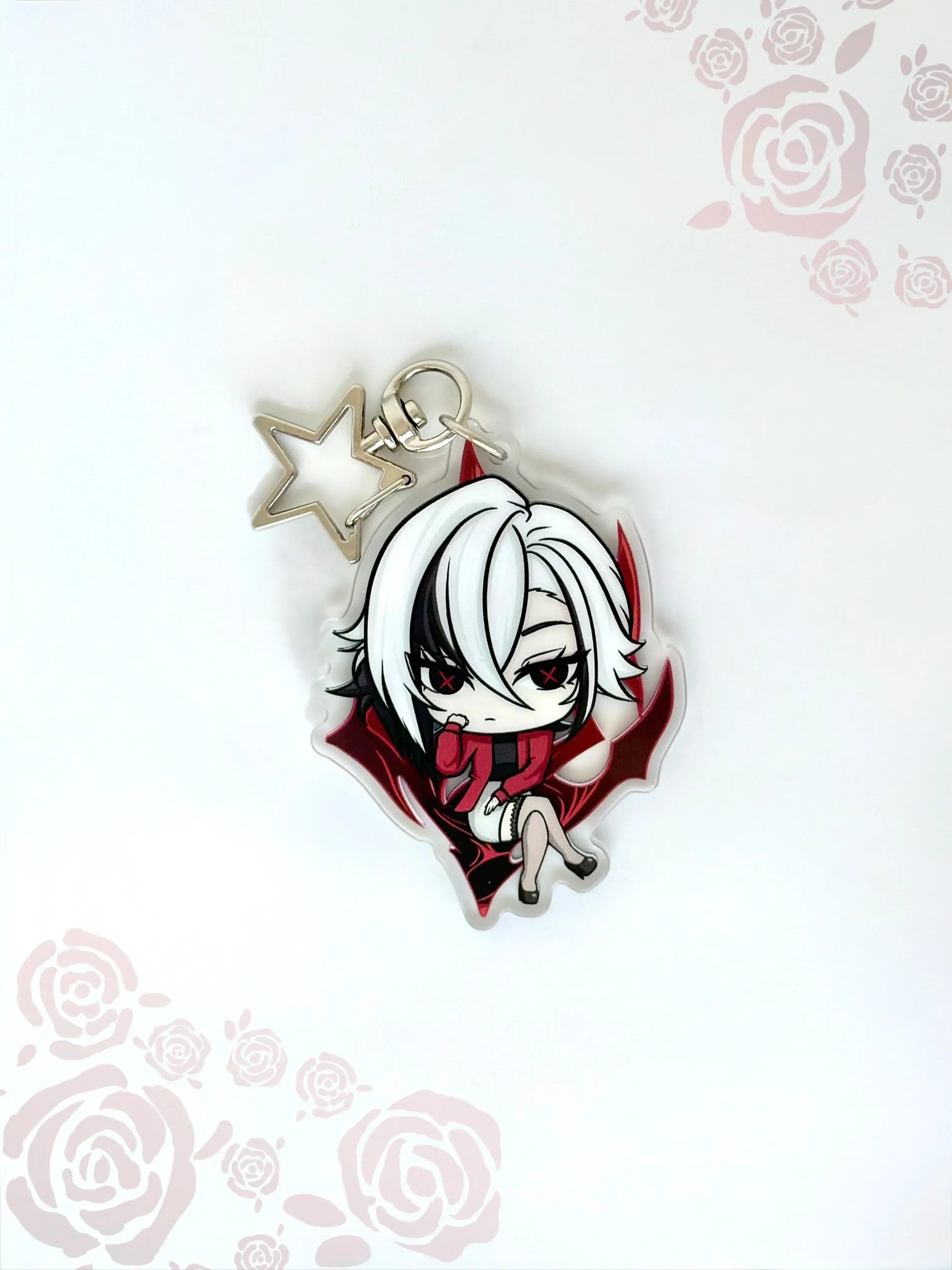 Front view of the Arlecchino double-sided anime keychain featuring vibrant character artwork.