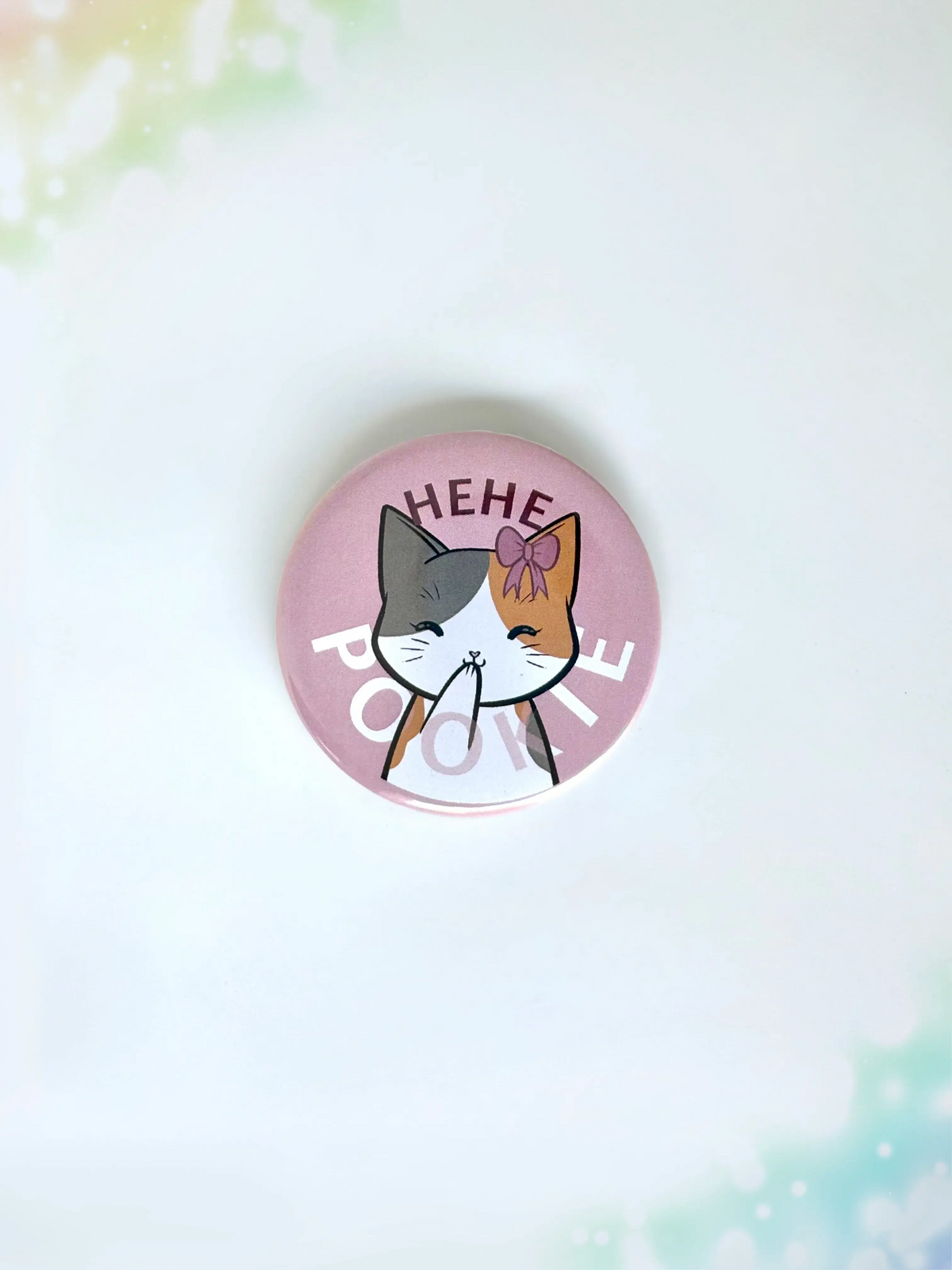 Cute cat button badge featuring an anime-style kitty with the text Hehe Pookie.
