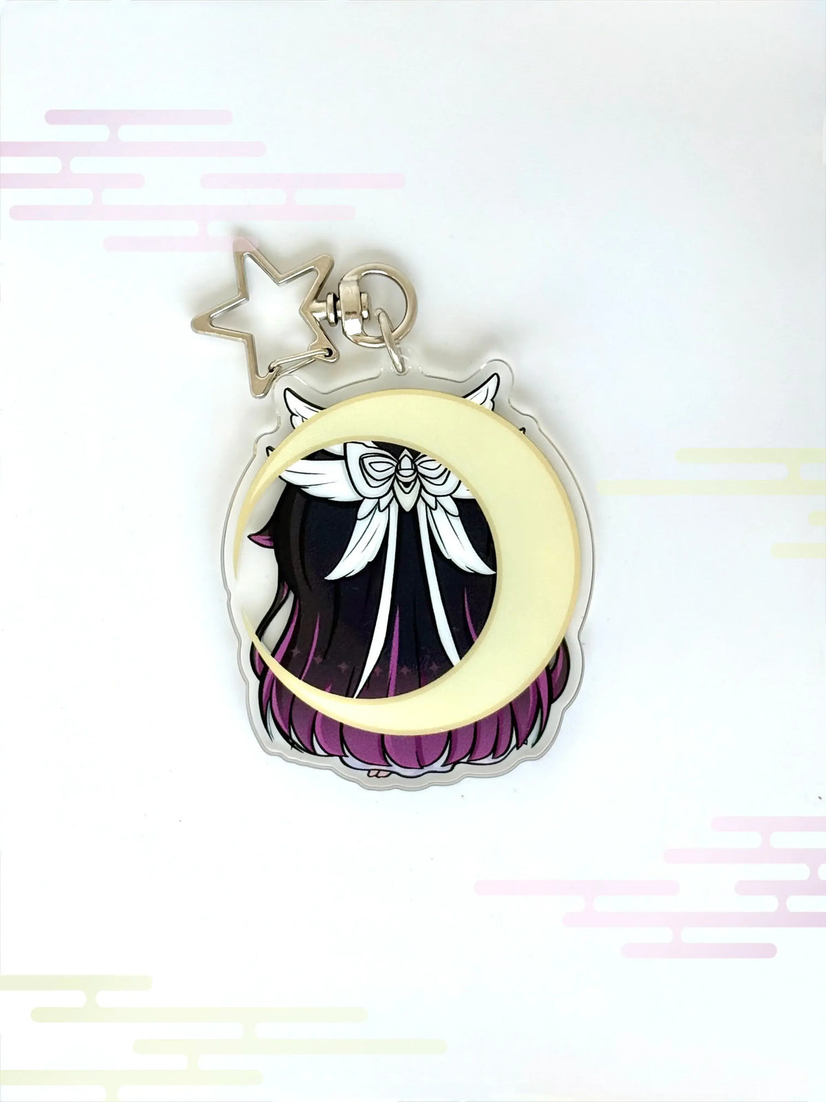Back view of the Columbina anime keychain showcasing a unique alternate art illustration.