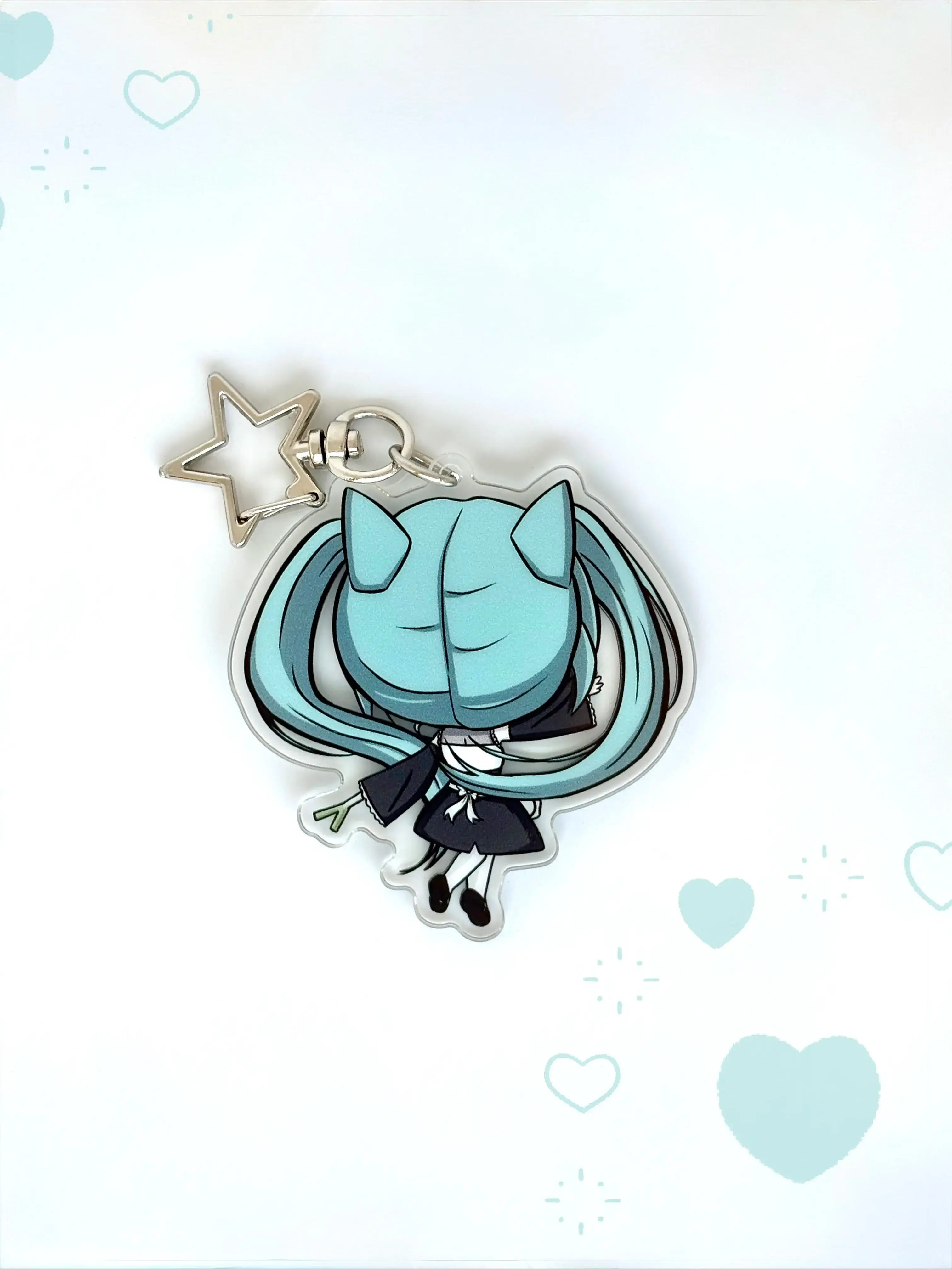 Back view of the Hatsune Miku anime keychain showcasing a unique alternate art illustration.
