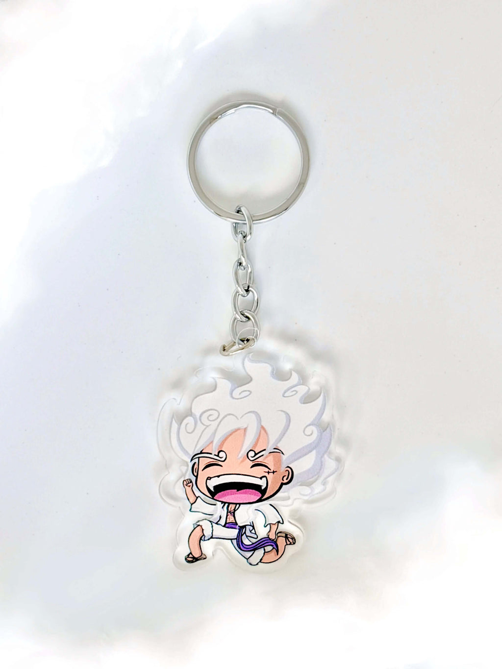 Luffy fanmade acrylic anime keychain on a plain white background