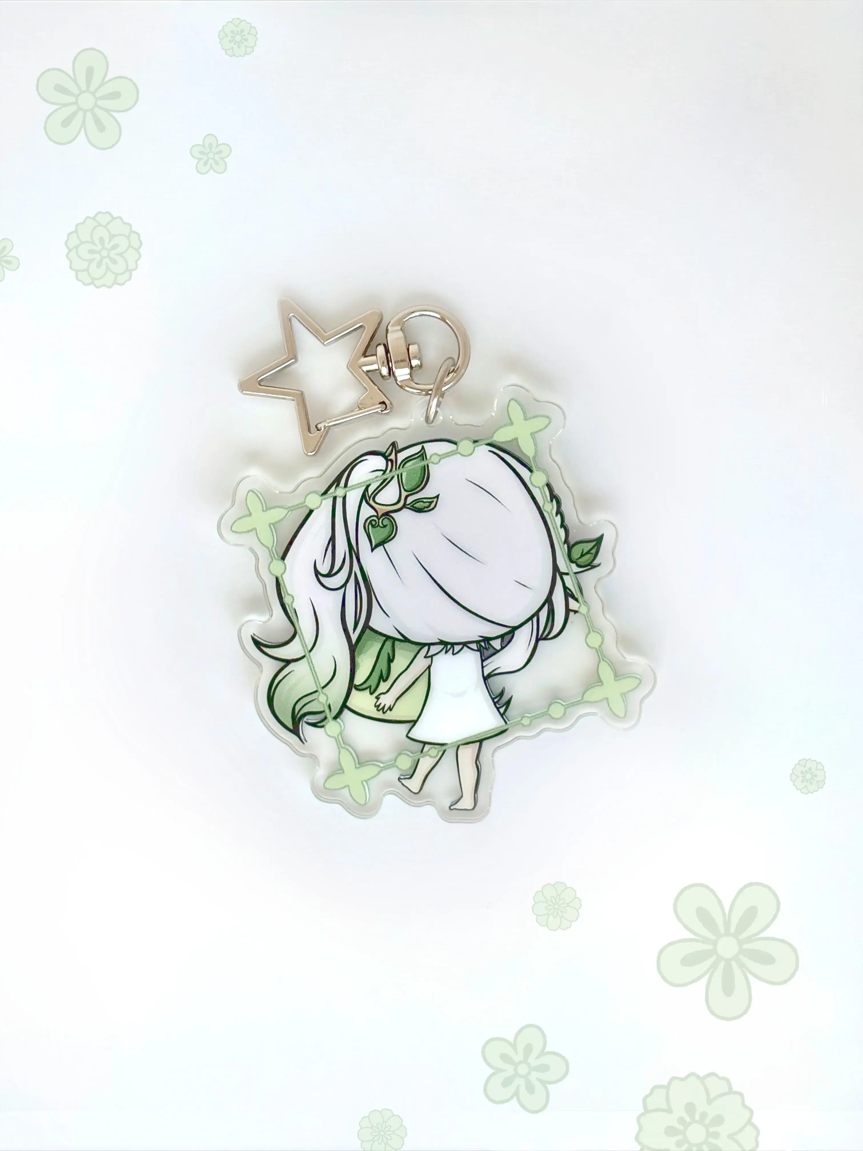 Back view of the Nahida anime keychain showcasing a unique alternate art illustration.